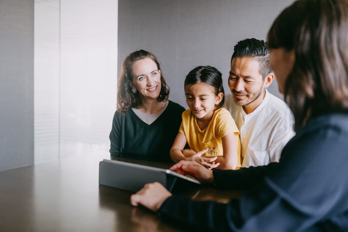 Family speaking with their adviser